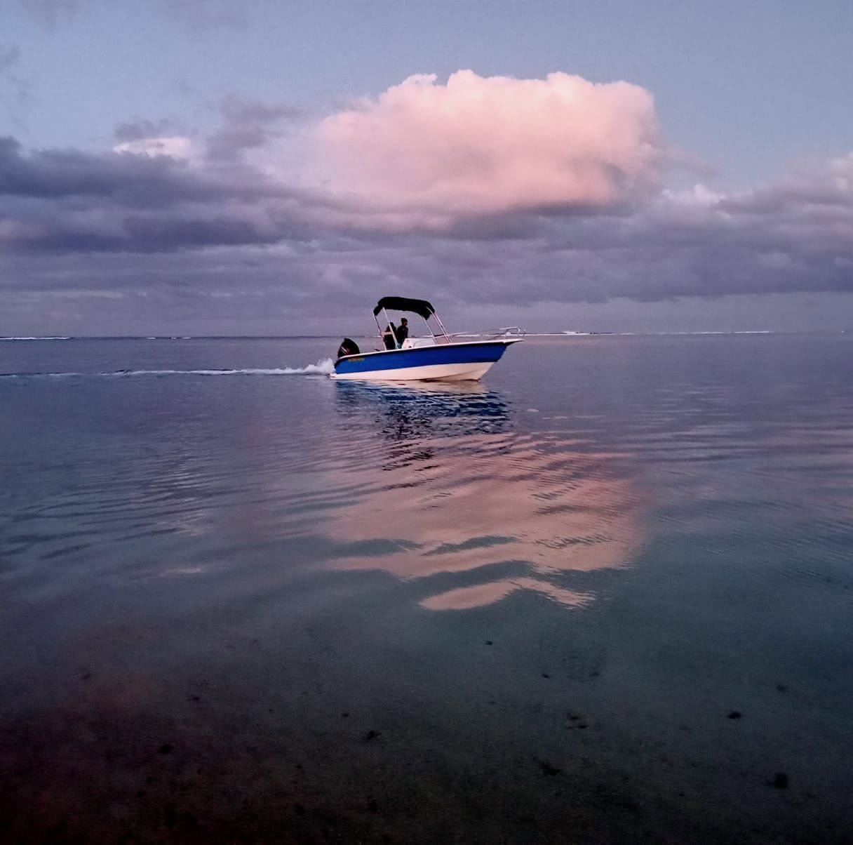 Aqua Morne boat cruising on the calm waters of Mauritius
