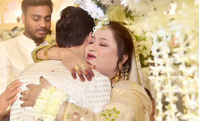 Bride and groom embracing