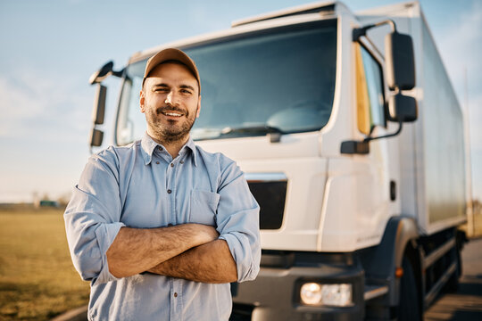 Man standing in front of truck