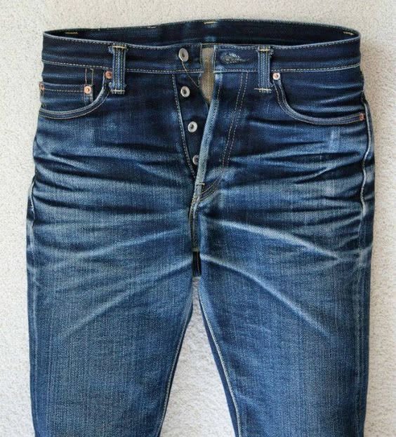 Classic raw indigo jeans flat lay