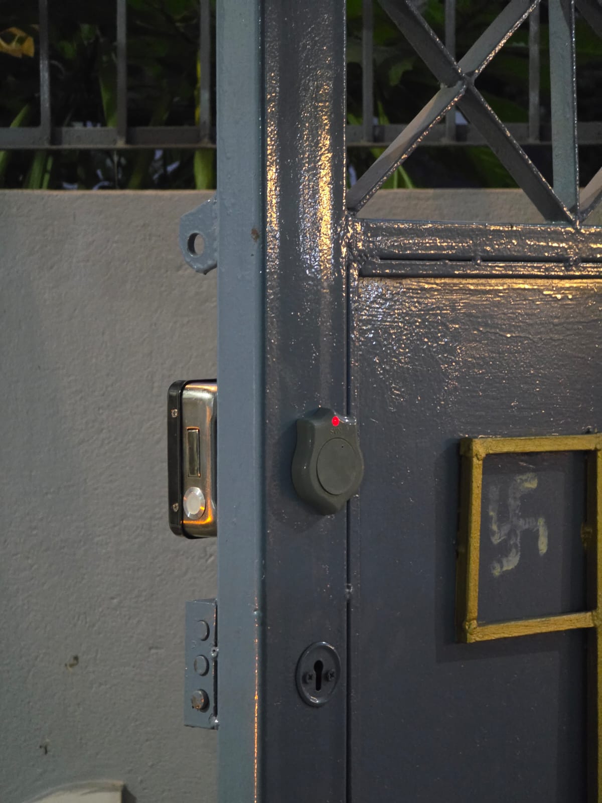 Motorized Lock on Metal Gate