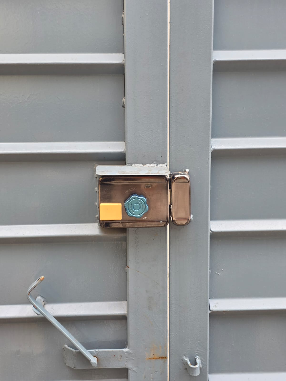 Lock on industrial metal gate