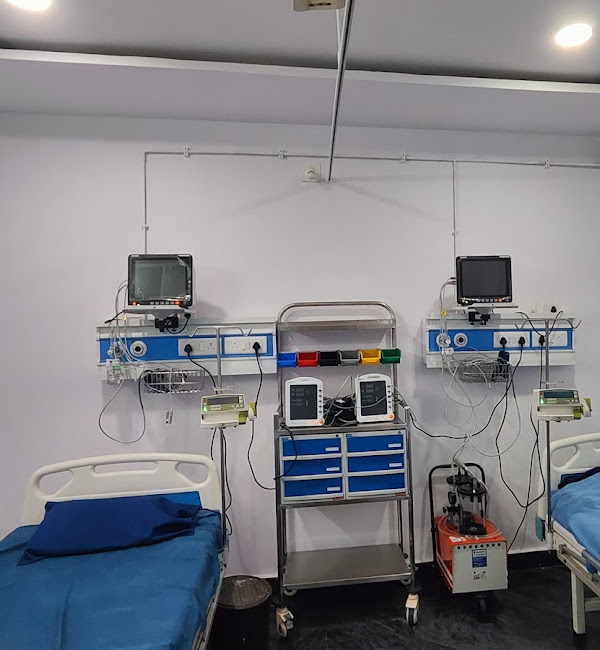 Patient ward with monitoring equipment at Sadhana Hospital, Srikakulam