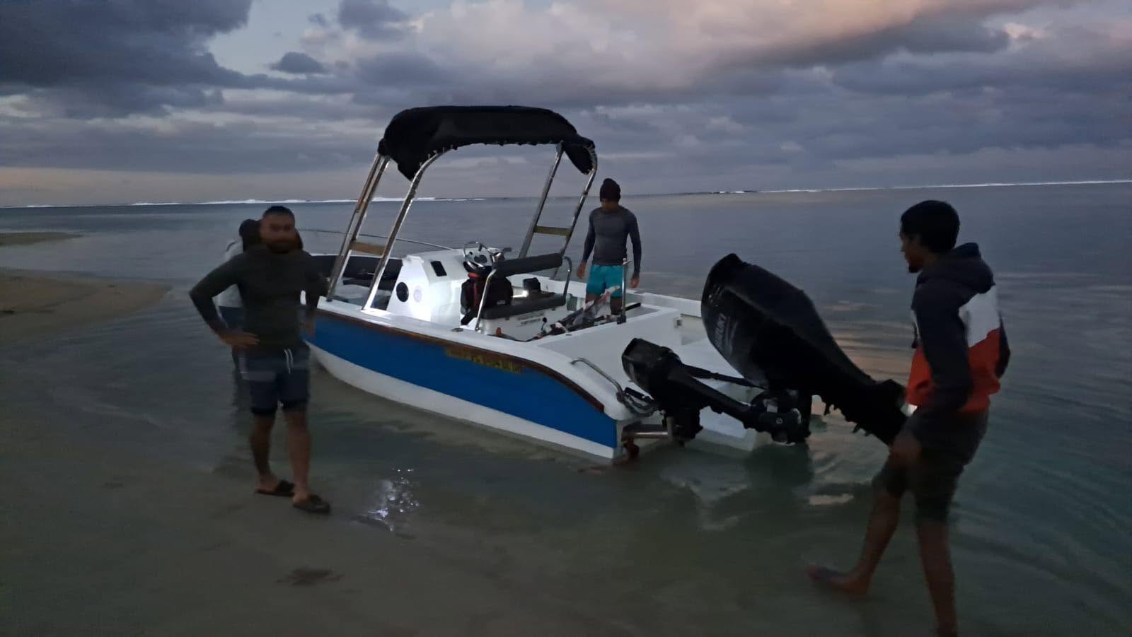Aqua Morne boat anchored in shallow Mauritius lagoon