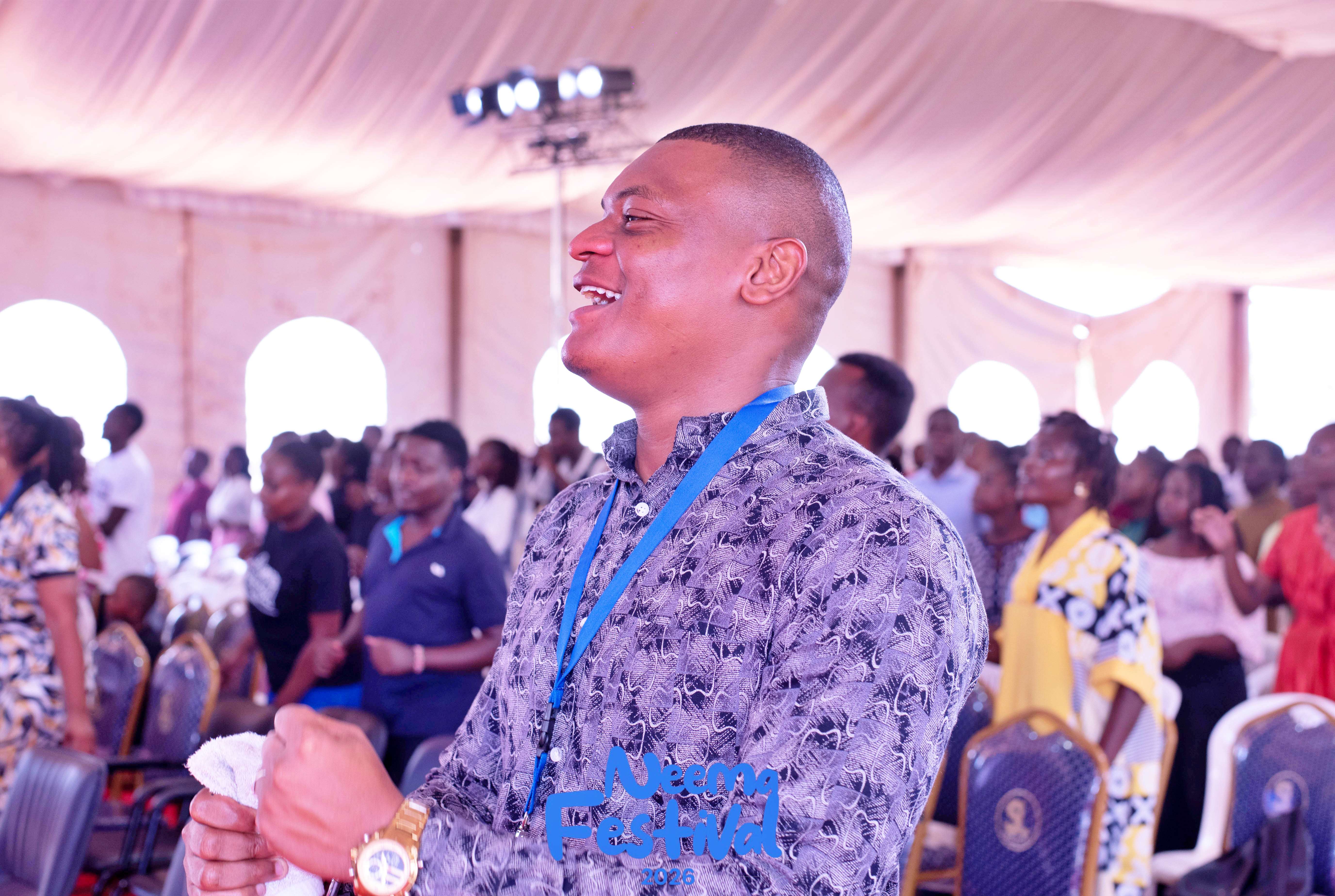 Neema Festival Man in Patterned Shirt