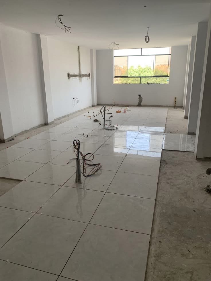 Floor tiling in progress