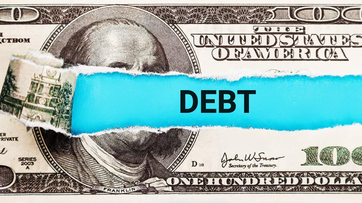 Debt Relief - Torn $100 Bill with DEBT text