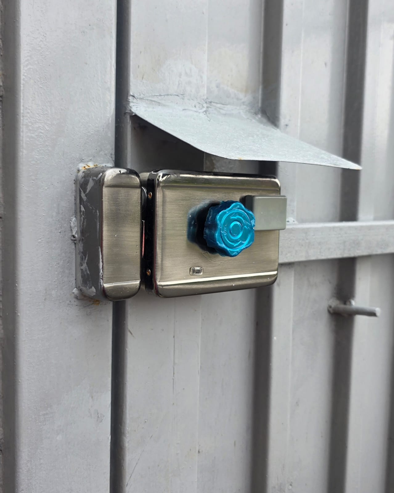 Lock installed on metal gate