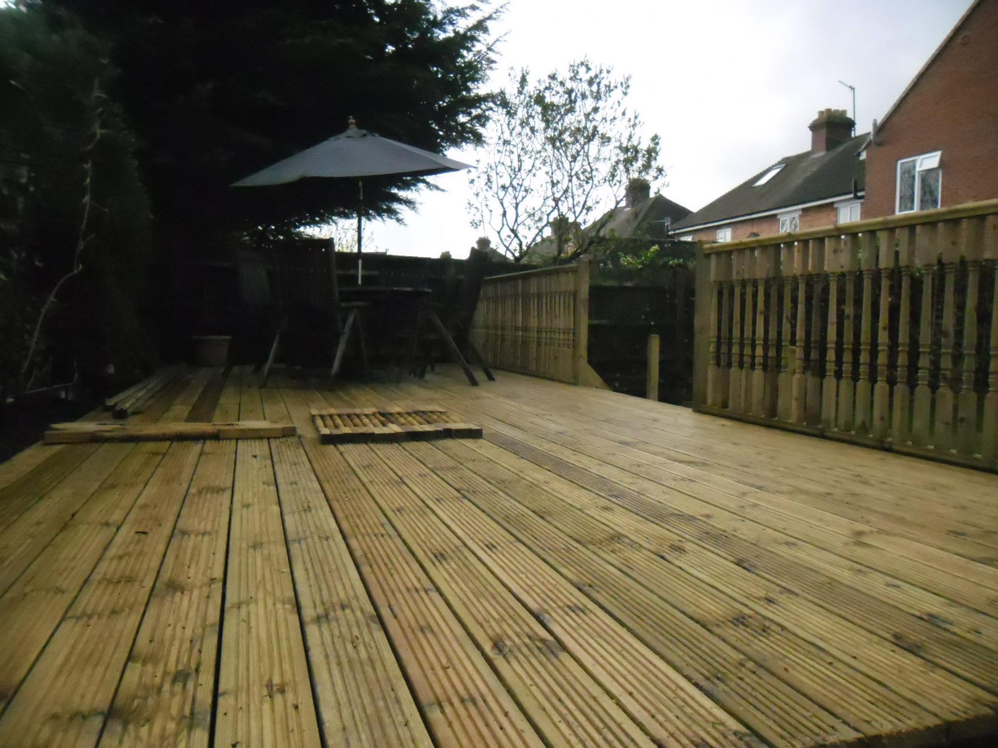 Residential backyard deck with seating
