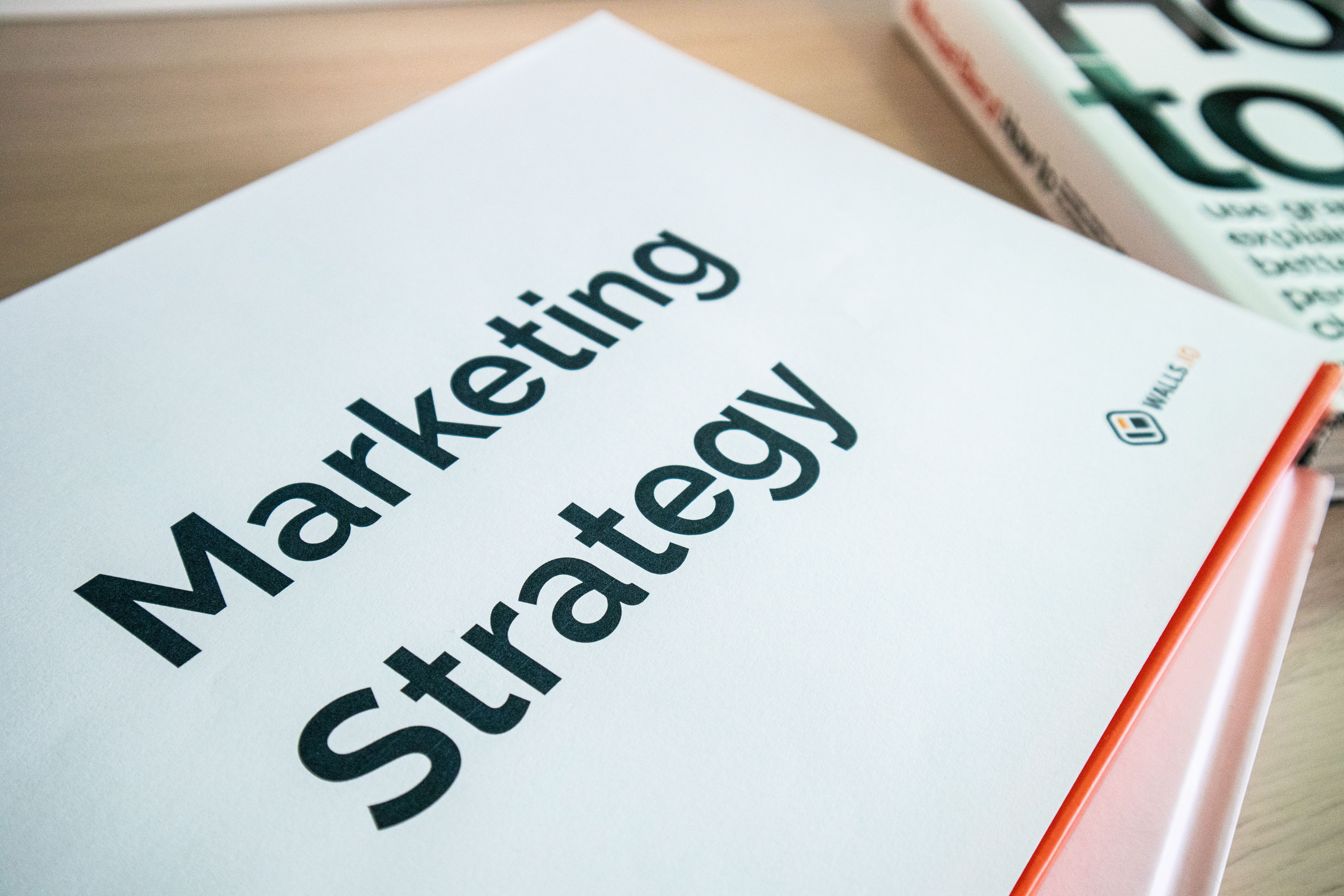 Marketing Strategy document on desk
