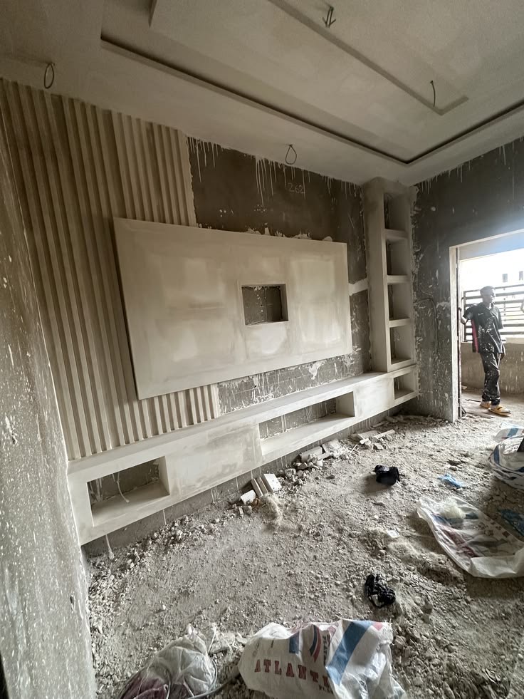 Before: Room under renovation with scattered materials