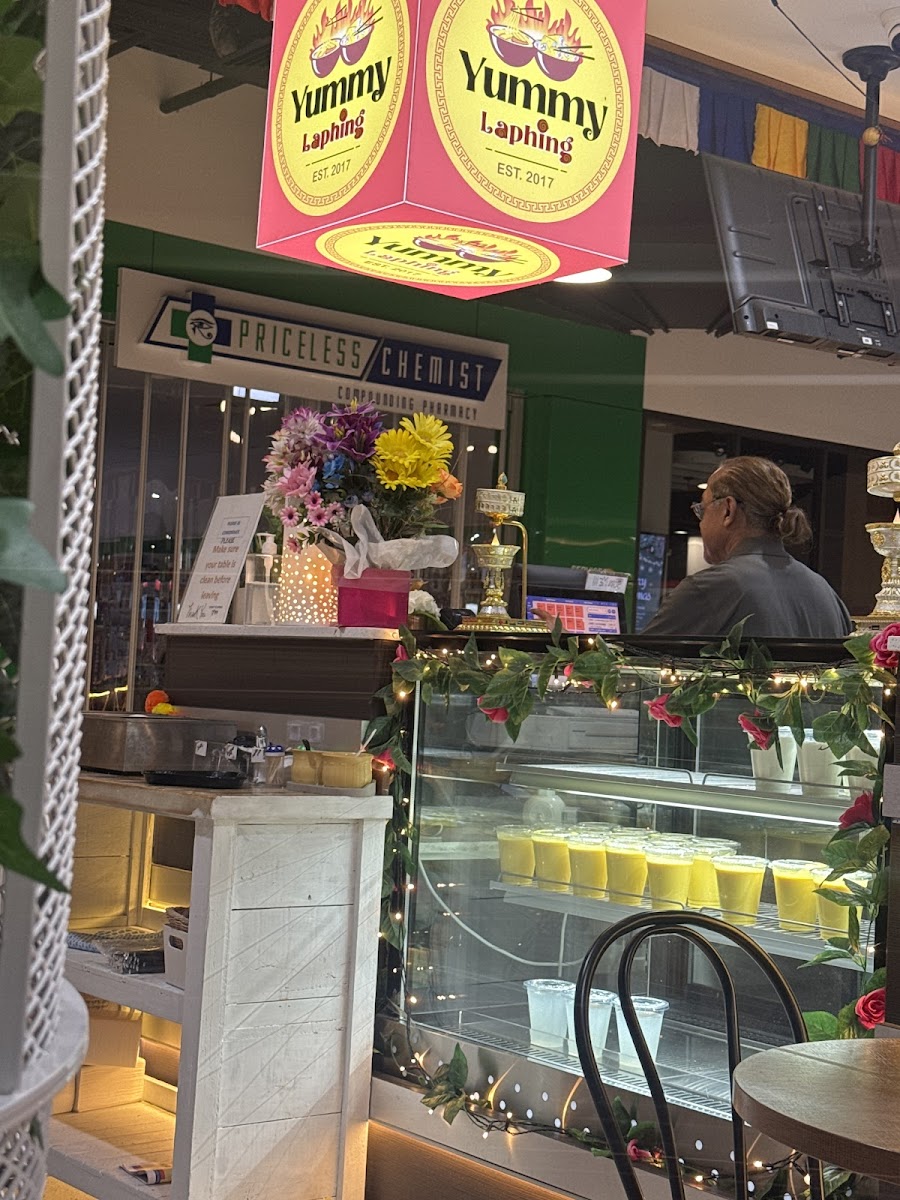 Yummy Laphing storefront signage at Granville Place Shopping Village with red Yummy Laphing EST.2017 lightbox