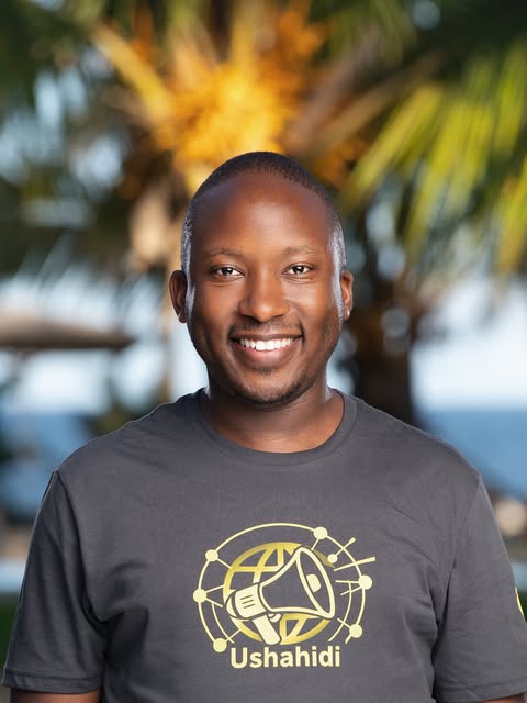 Man in Ushahidi T-shirt Outdoors