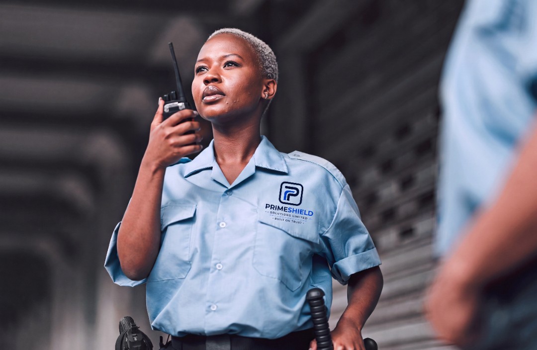 PrimeShield security personnel communicating via radio