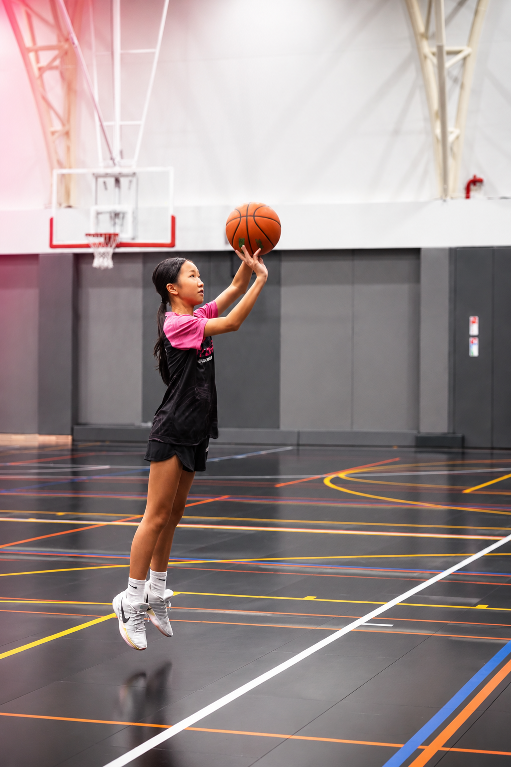 U9 youth basketball player shooting during training at LIT Elite Academy