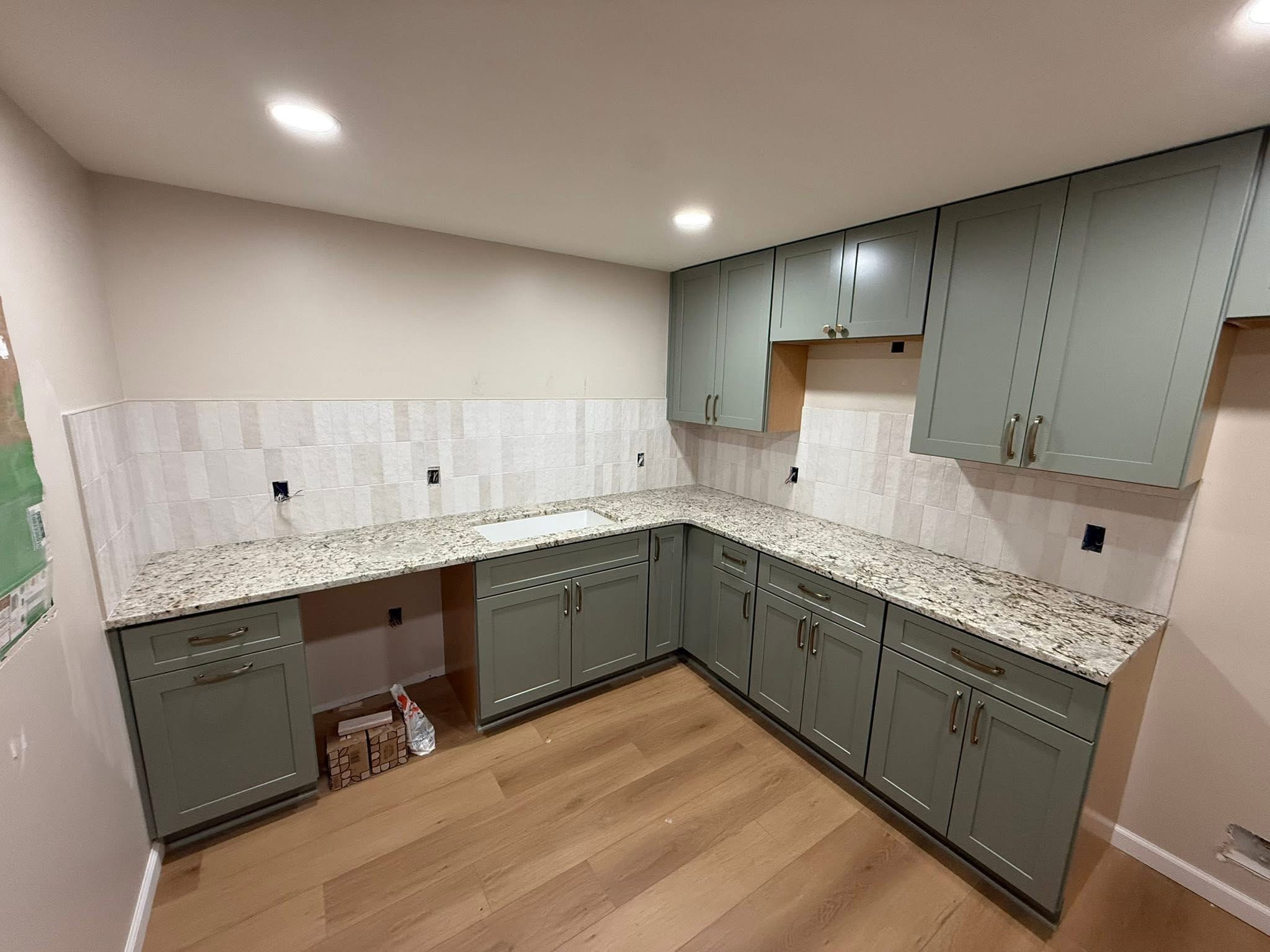 Luxury remodeled kitchen by K.A.S Construction Services
