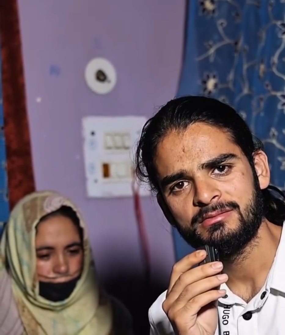 Volunteer speaking with the family