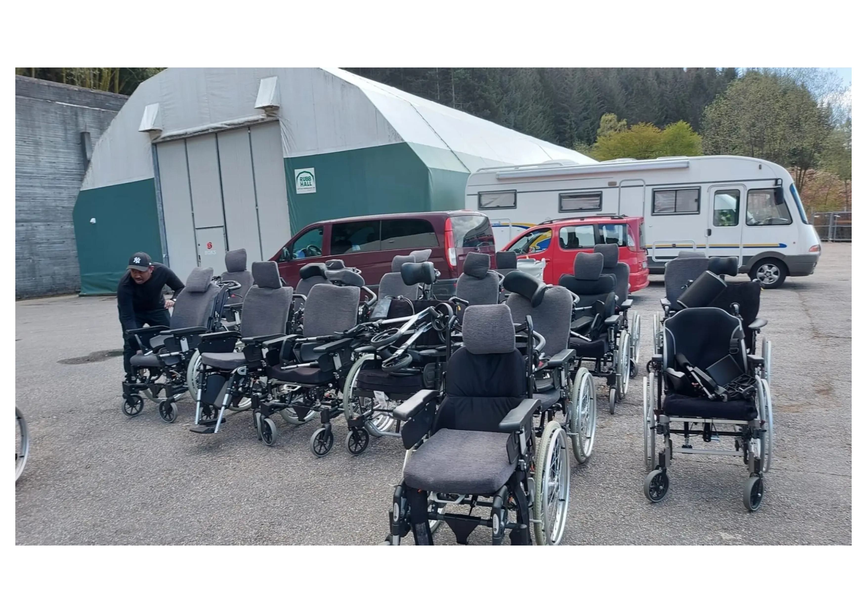 Wheelchairs lined up at the RUBB HALL distribution site in Bole