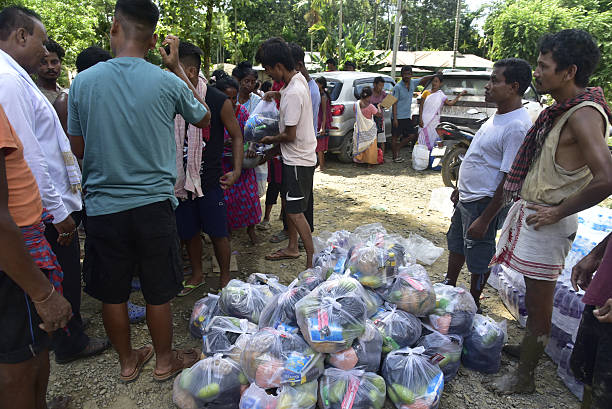 People gathered with relief supplies