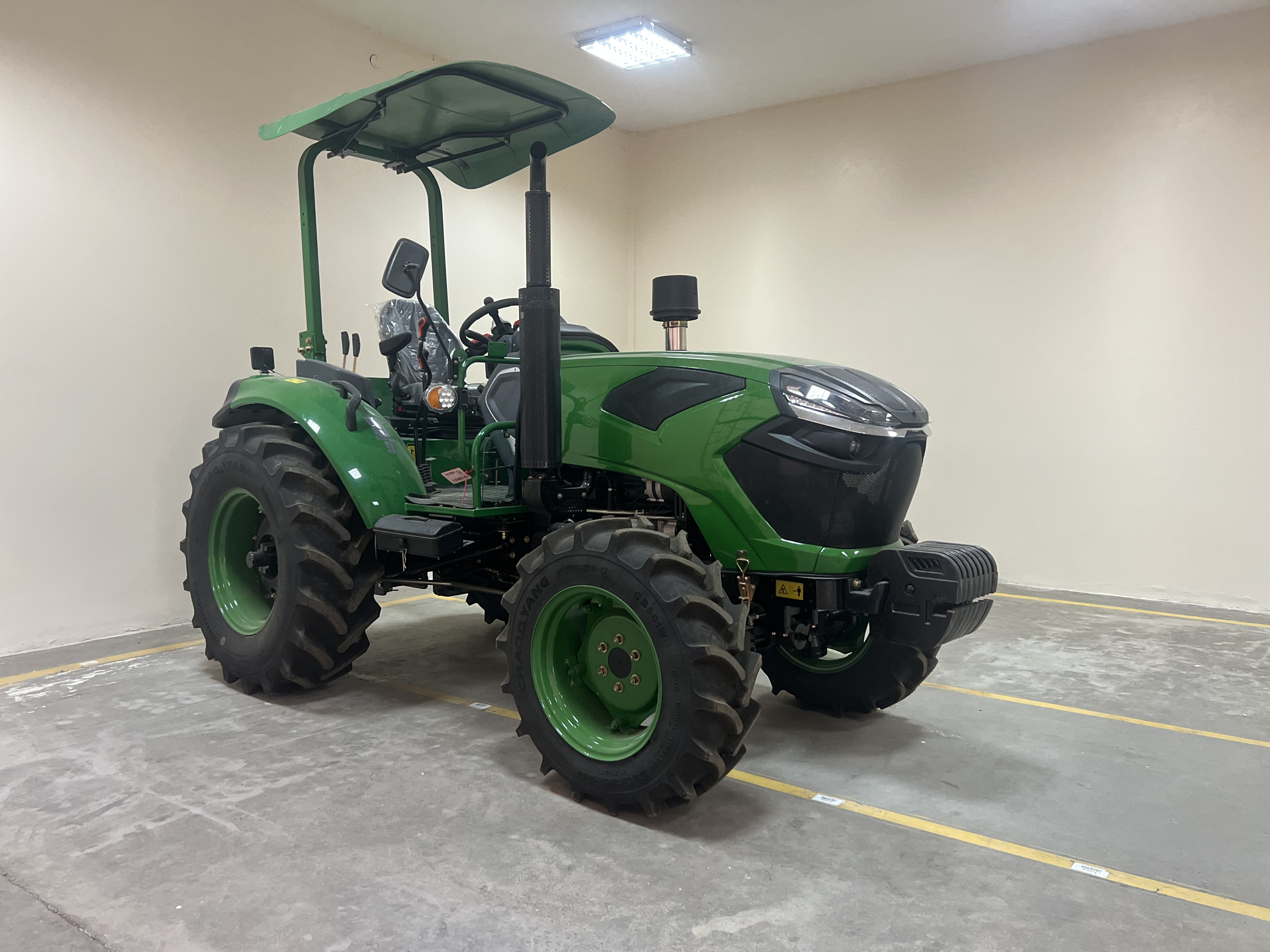 Green tractor - agricultural machinery