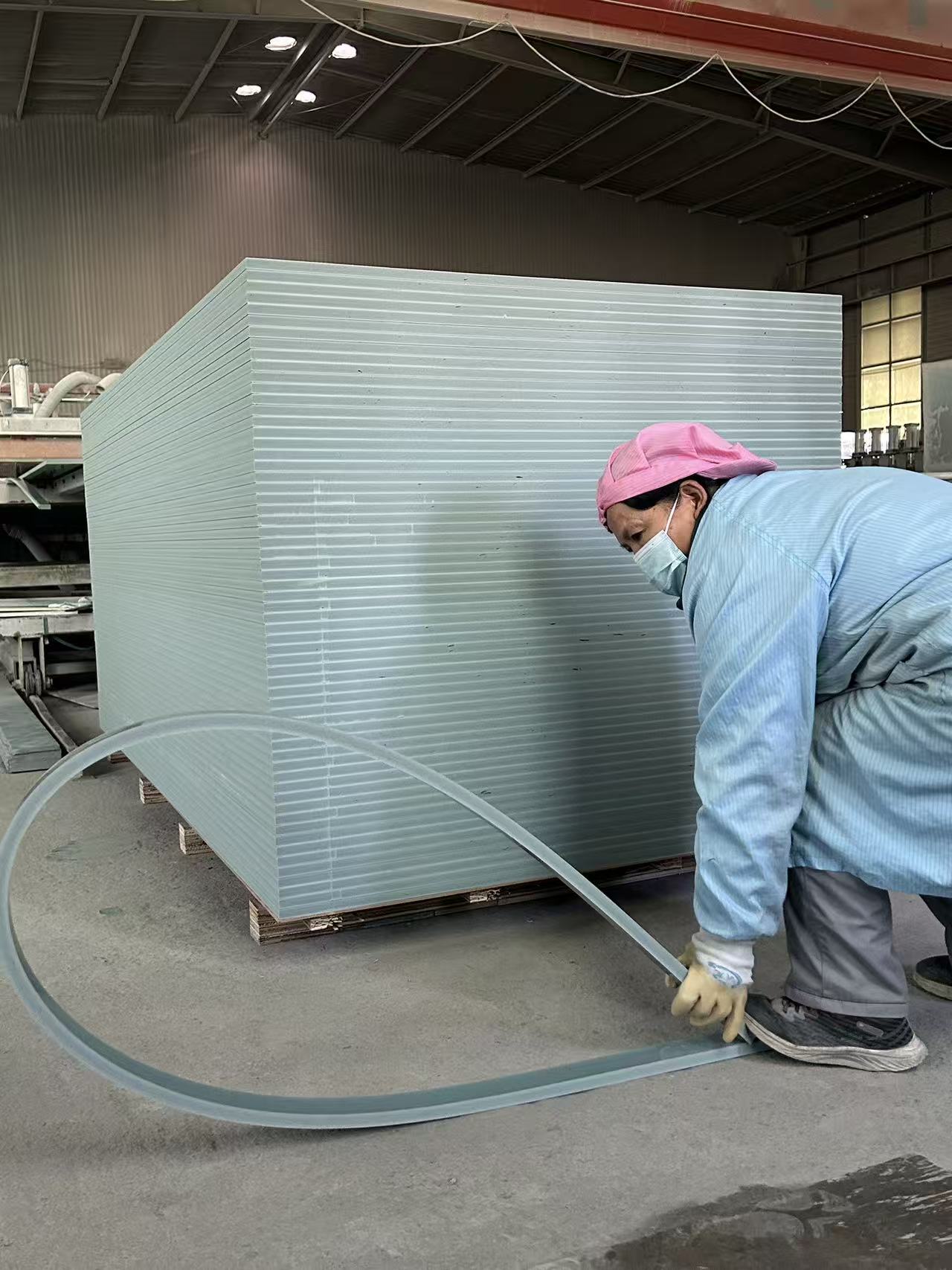 PVC formwork panel production line worker processing panels