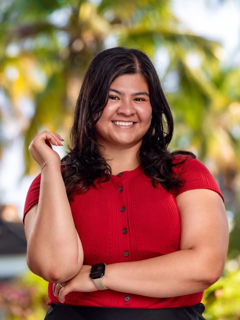 Woman in Red Shirt Smiling