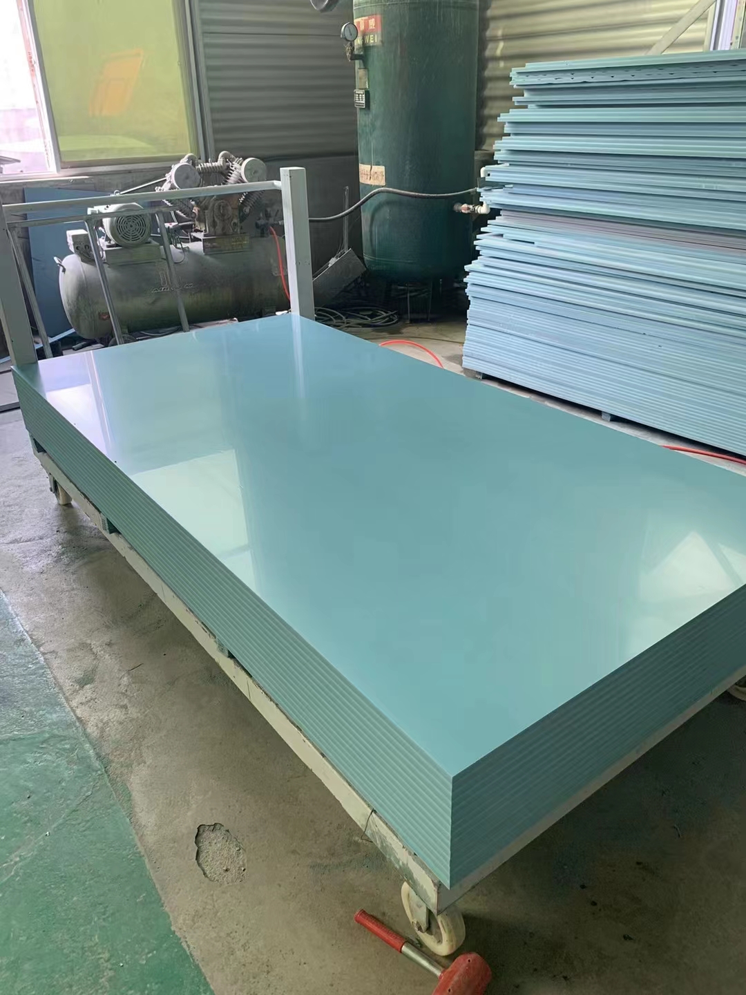 PVC formwork panels on workshop floor ready for quality inspection
