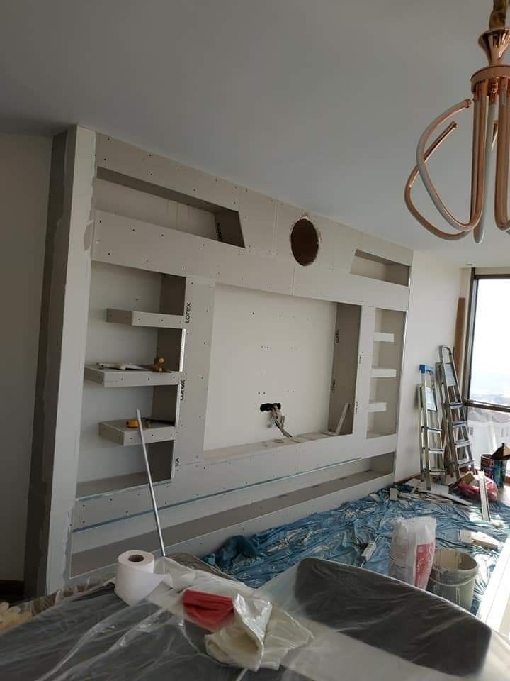 After: Custom cabinetry with designed shelving and decorative ceiling