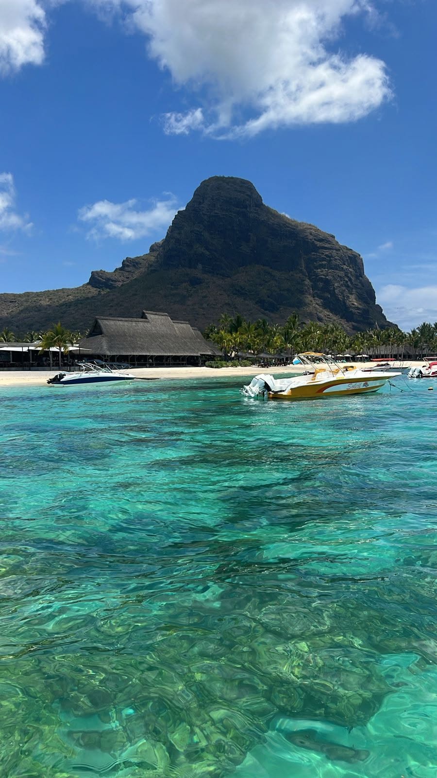 Mauritius coast with turquoise lagoon and mountains