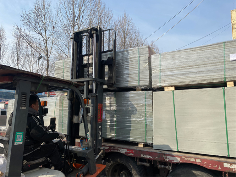 Plastic PVC beam formwork panels being loaded for export delivery