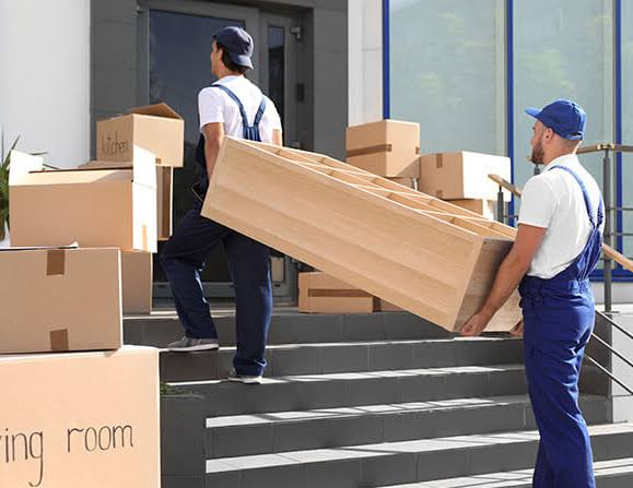 SK Cargo team moving items at building entrance