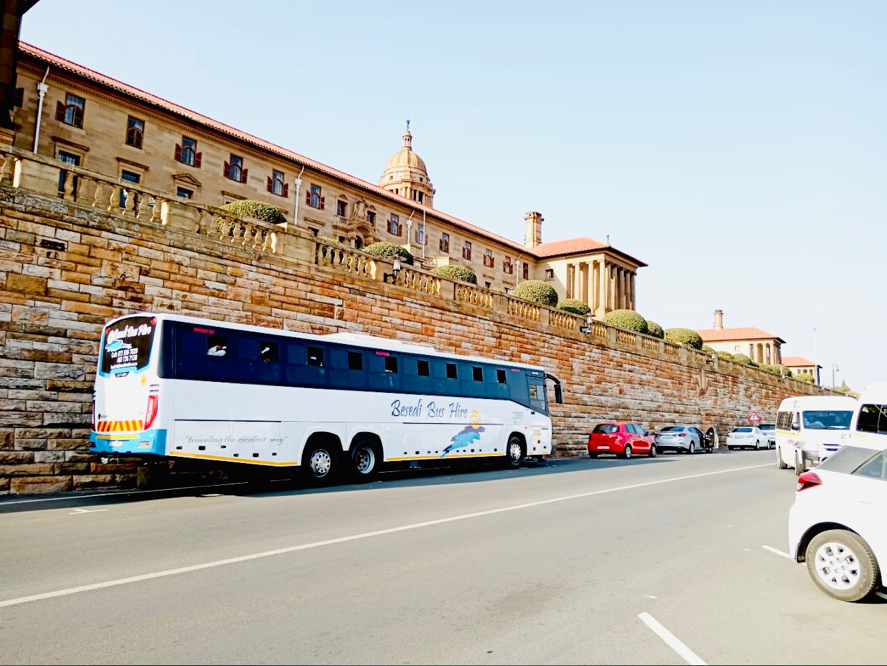 Besedi Bus near historical building